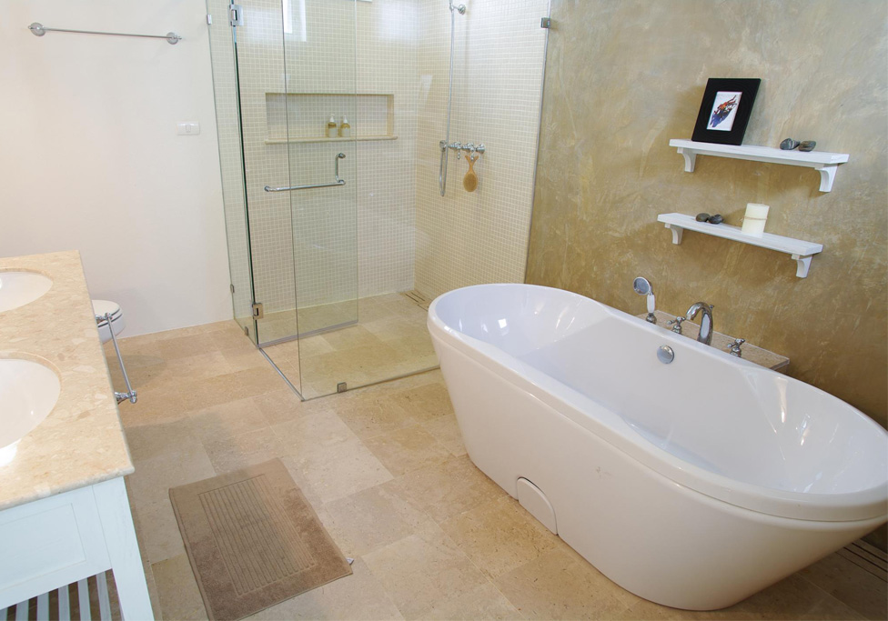 Updated shower and bathtub in a remodeled bathroom